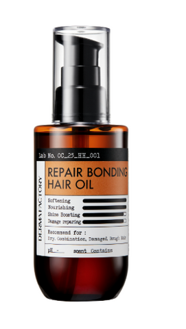 Відновлююча олійка для волосся Repair Bonding Hair Oi 100мл DF138 фото